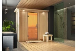 KARIBU Variado Sauna, Naturbelassen, Fichte, 210 X 132 X 202 Cm, Fronteinstieg,mit Klarglastür Und Kranz, SET Mit Ofen 4,5 KW Integr. Str.